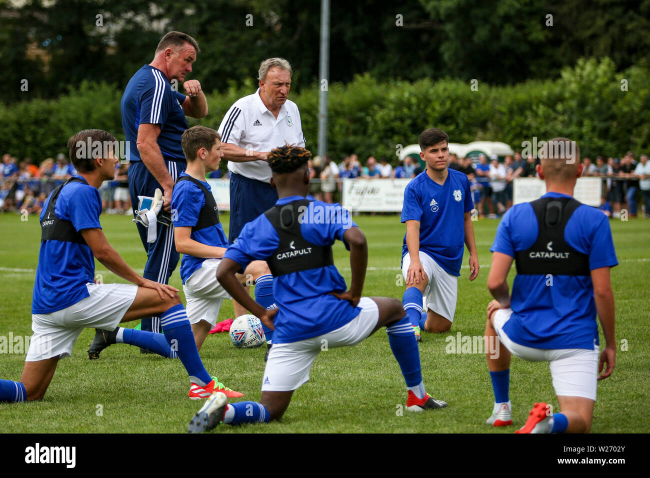 CARDIFF, UNITED KINGDOM. 5th July 2019. Manager Neil Warnock of Cardiff City FC addressing his squad in the warm up before the pre-season friendly match at Rhiw'r Ddar. © Photo Matthew Lofthouse - Freelance Photographer Stock Photo