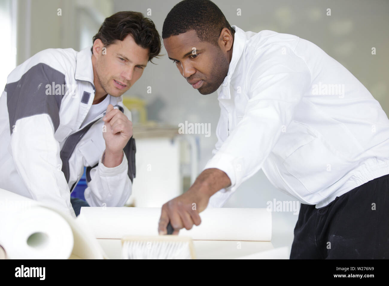 male painters are at work Stock Photo