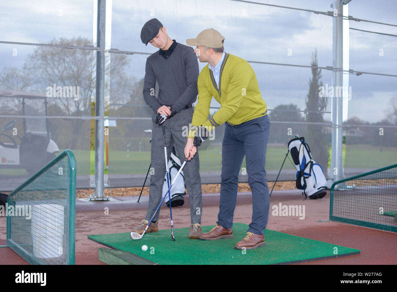 beginner hitting golf ball Stock Photo Alamy