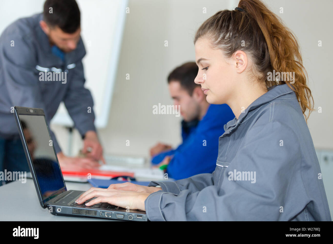 young woman engineer working on robotics project Stock Photo