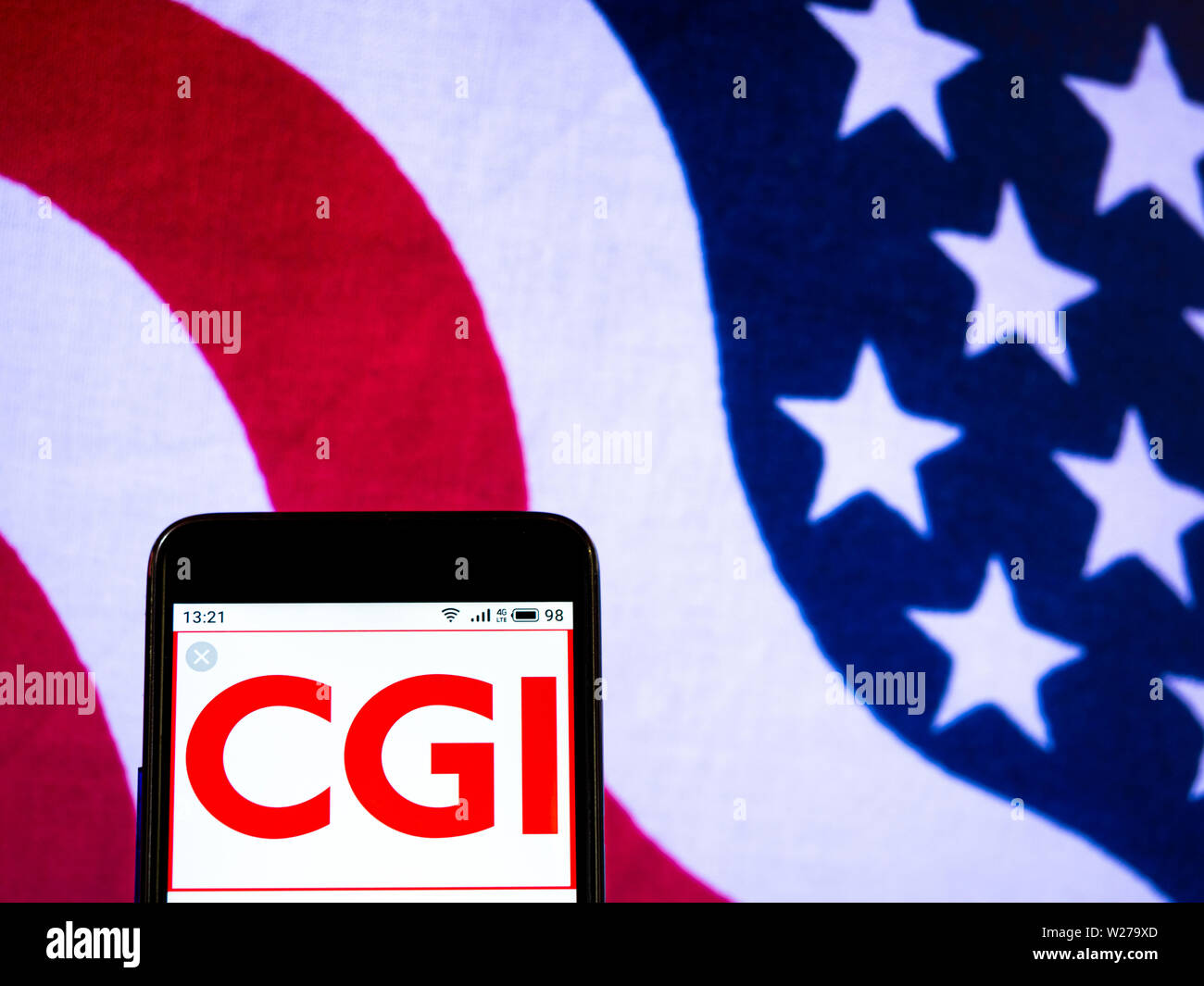 In this photo illustration the CGI Inc. logo is seen displayed on a