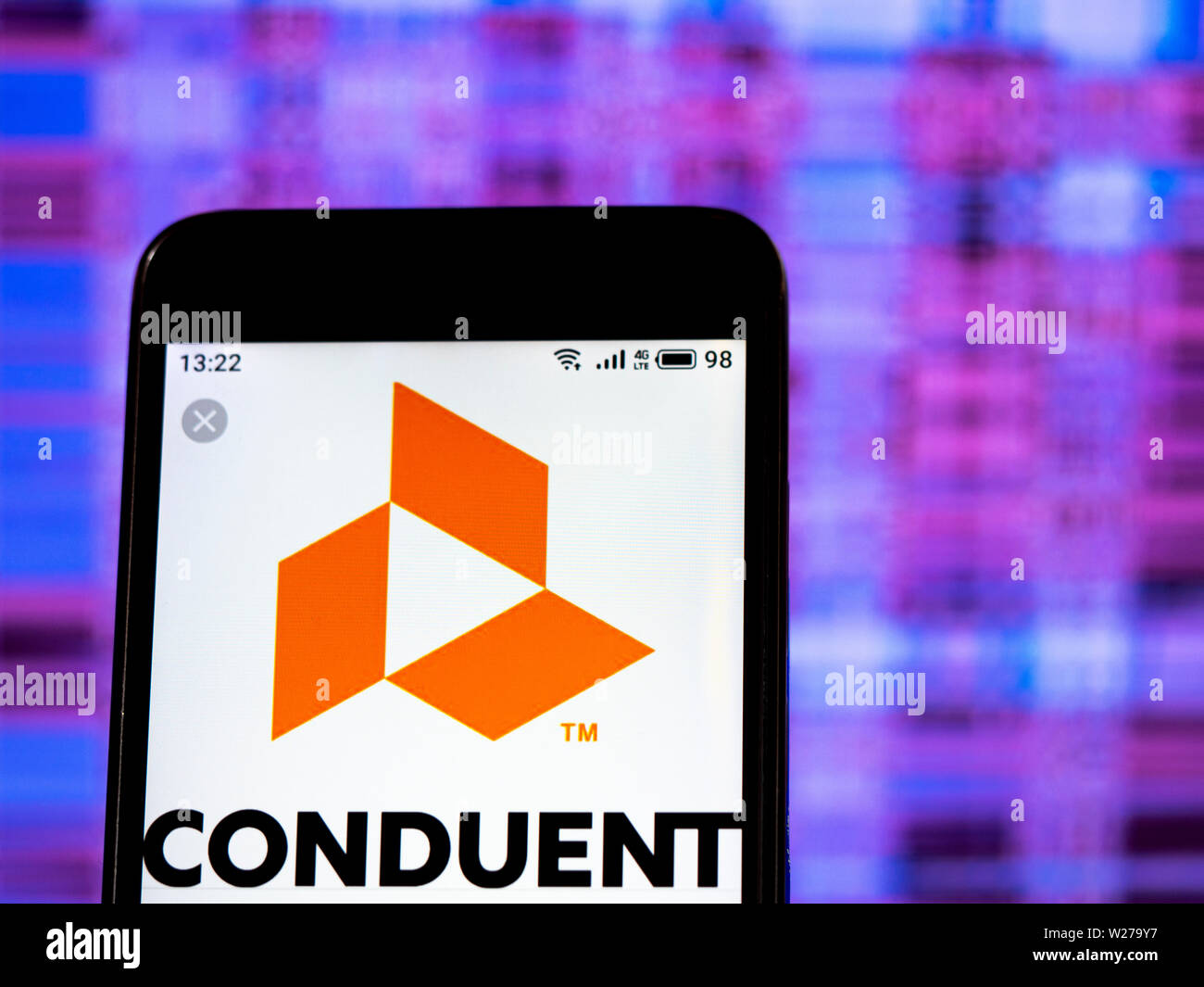In this photo illustration the Conduent Inc. logo is seen displayed on a smartphone Stock Photo
