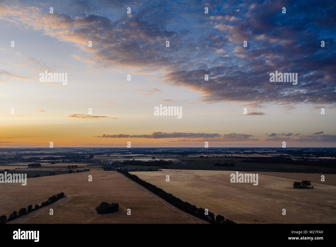 Aerial drone photography of farm lands. Agricultural parcels of flat lands in Poland, Europe