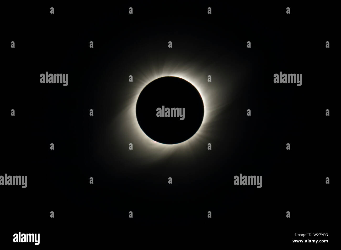 The Solar Corona atmosphere layer during Total Solar Eclipse Chile 2019, amazing view of the Sun covered by the Moon during totality phase Stock Photo