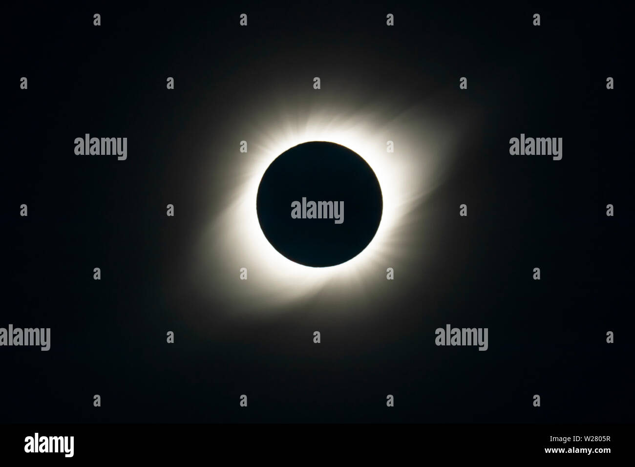 The Solar Corona atmosphere layer during Total Solar Eclipse Chile 2019, amazing view of the Sun covered by the Moon during totality phase Stock Photo