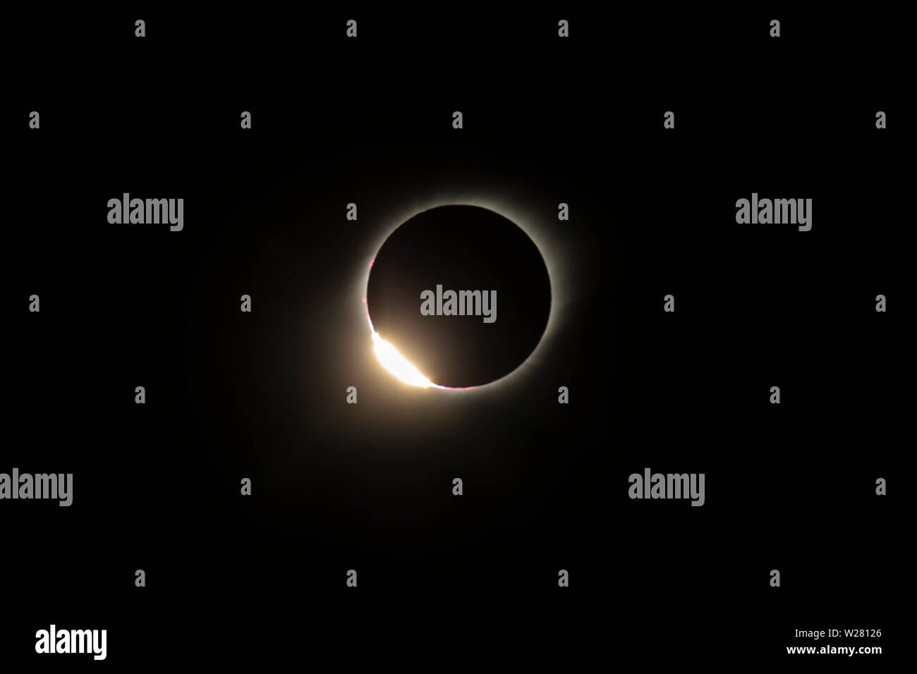The Baily's beads effect and Diamond Ring effect during Total Solar Eclipse Chile 2019, amazing view of the Sun covered by the Moon during totality Stock Photo