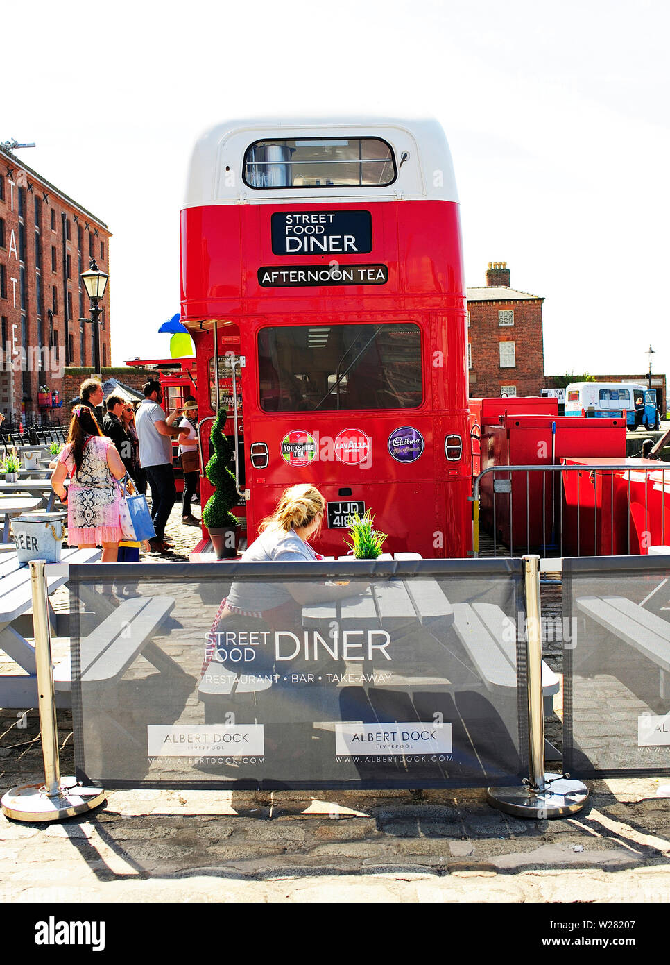 London route master bus converted into a restaurant and parked on the Albert Dock in Liverpool Stock Photo
