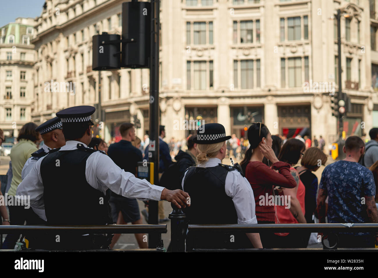 London, UK - June, 2019. Police officers patrolling Oxford Circus in central London. Stock Photo