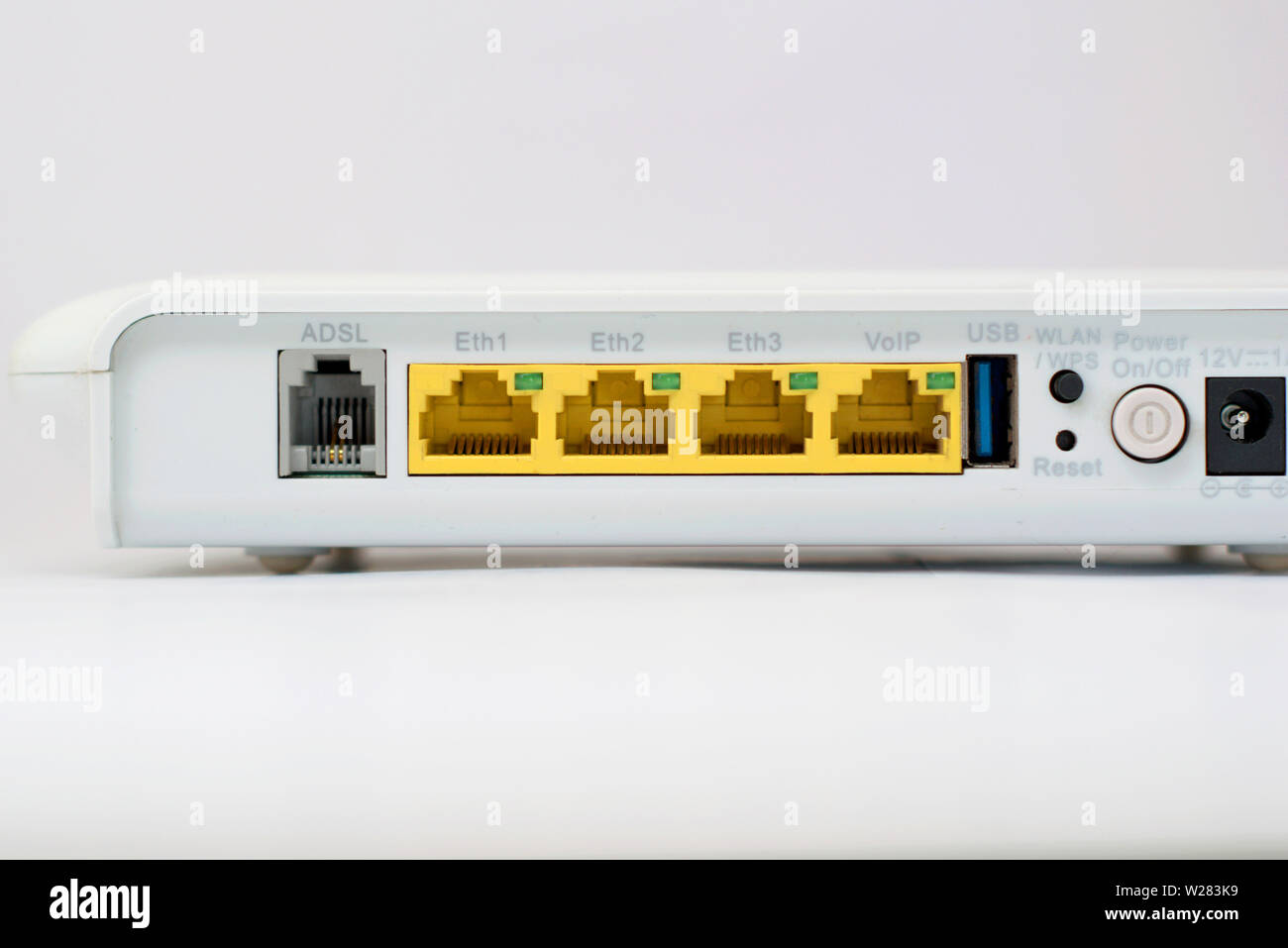 Back of a ADSL router modem, prominently showing the connector sockets  Stock Photo - Alamy