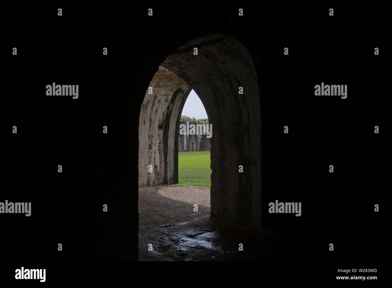 Looking through the casemate arches toward the parade ground at Fort Morgan, Alabama. Stock Photo