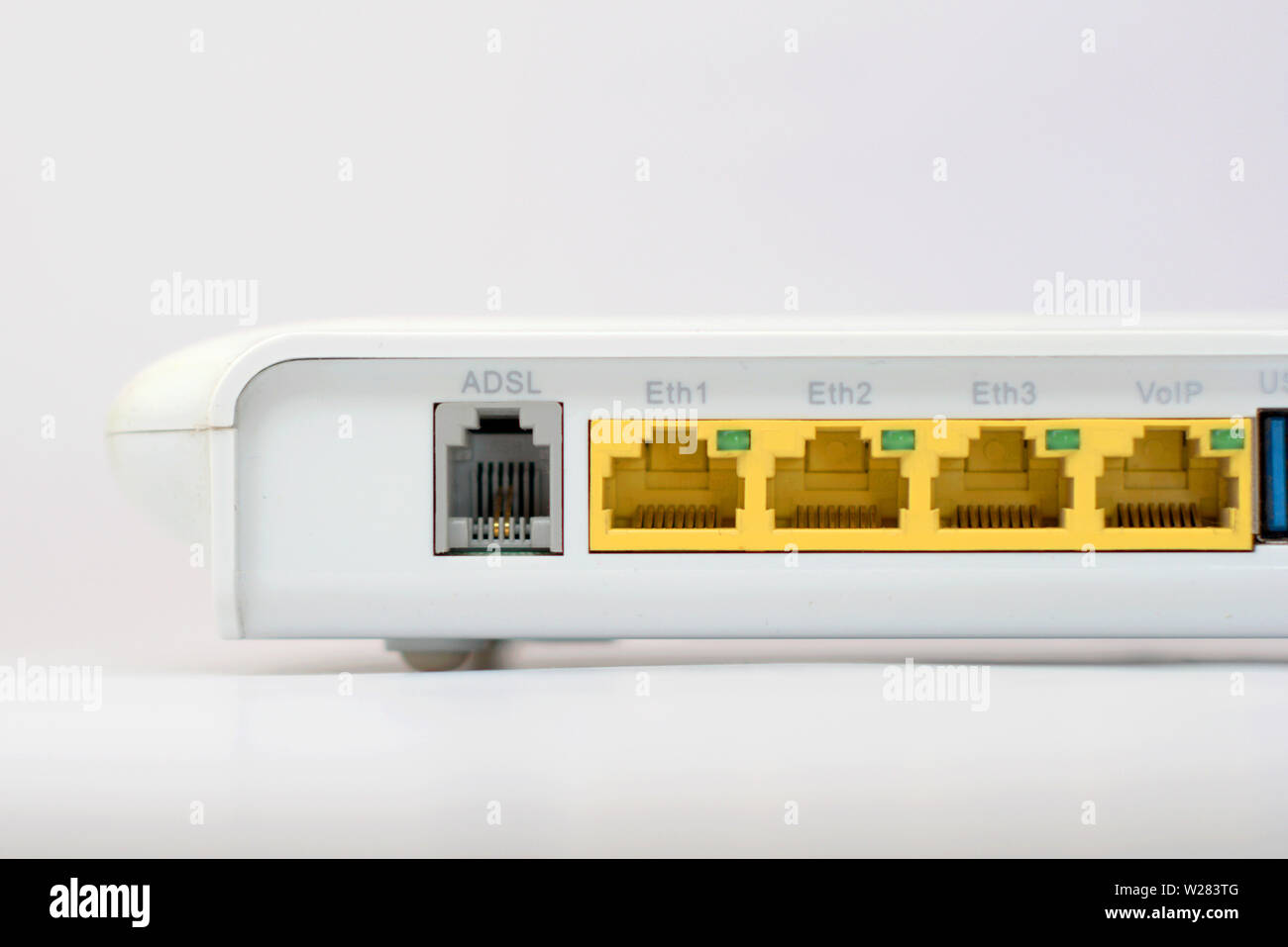 Back of a ADSL router modem, prominently showing the connector sockets  Stock Photo - Alamy