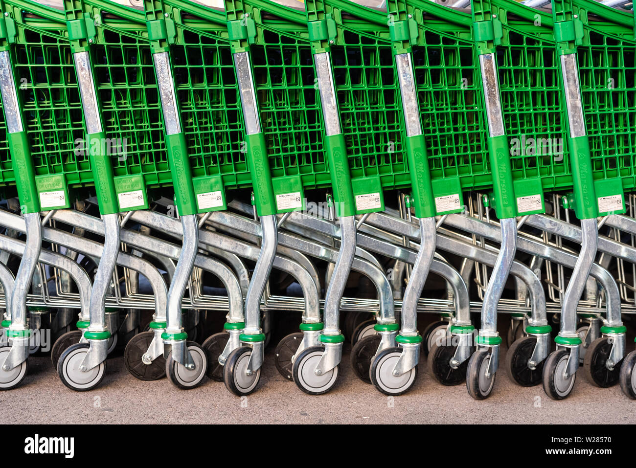 Valencia, Spain July 3, 2019 Lines of metal supermarket trolleys in