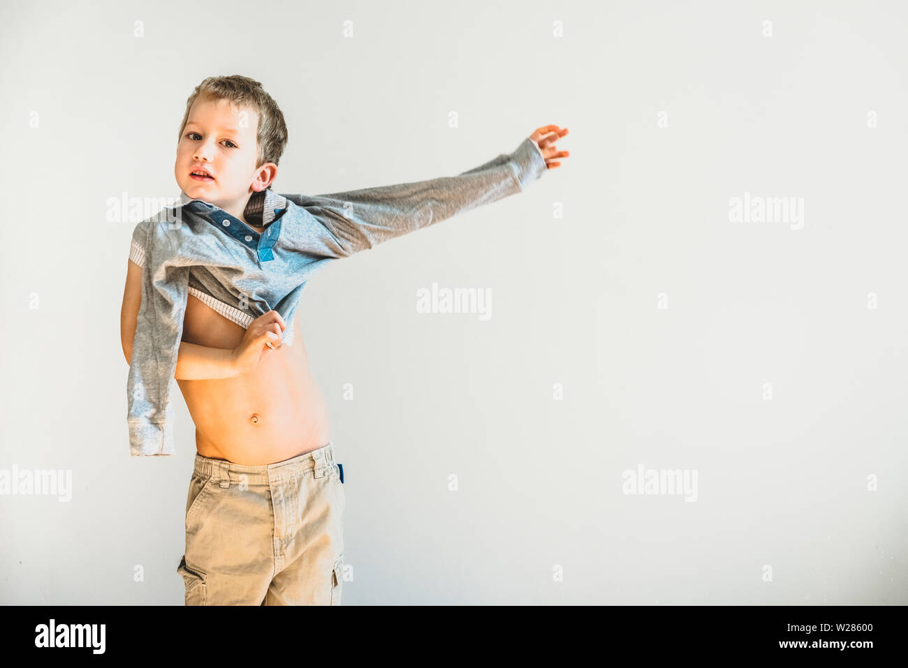 child undress Child undressing before going to sleep, alone, learning to be independent  Stock Photo - Alamy
