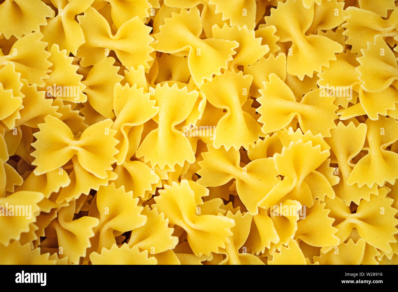 background-of-dry-bow-tie-pasta-stock-photo-alamy