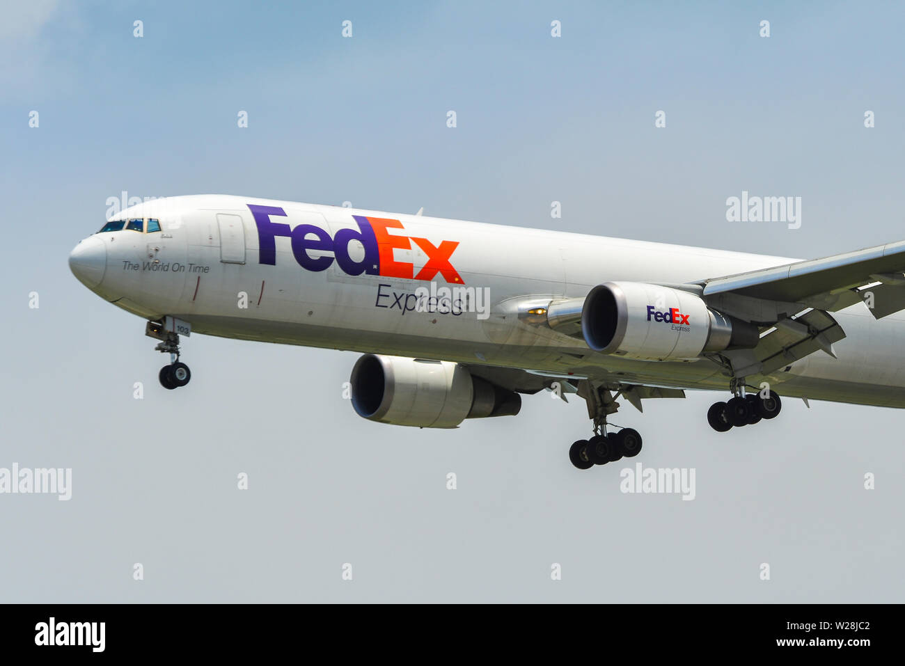 Singapore - Mar 26, 2019. N103FE Federal Express (FedEx) Boeing 767-300ER landing at Changi Airport (SIN). Changi hits record 65 million passengers in Stock Photo