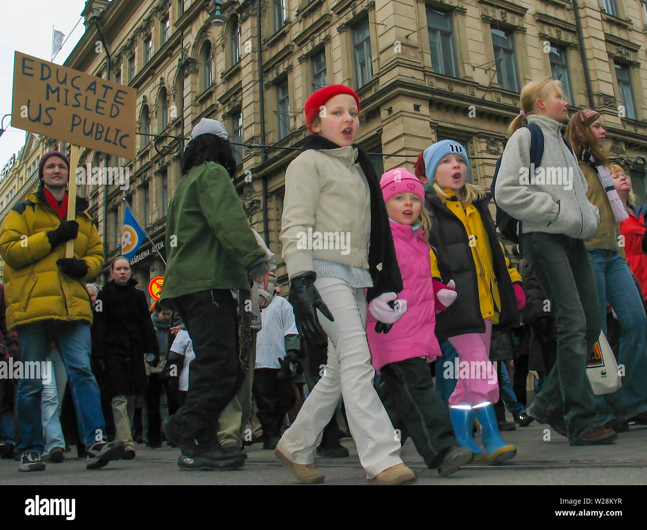 Helsinki, Finland - March 22, 2003: Anti-war protesters march through downtown Helsinki to protest the impending United States invasion of Iraq. Stock Photo