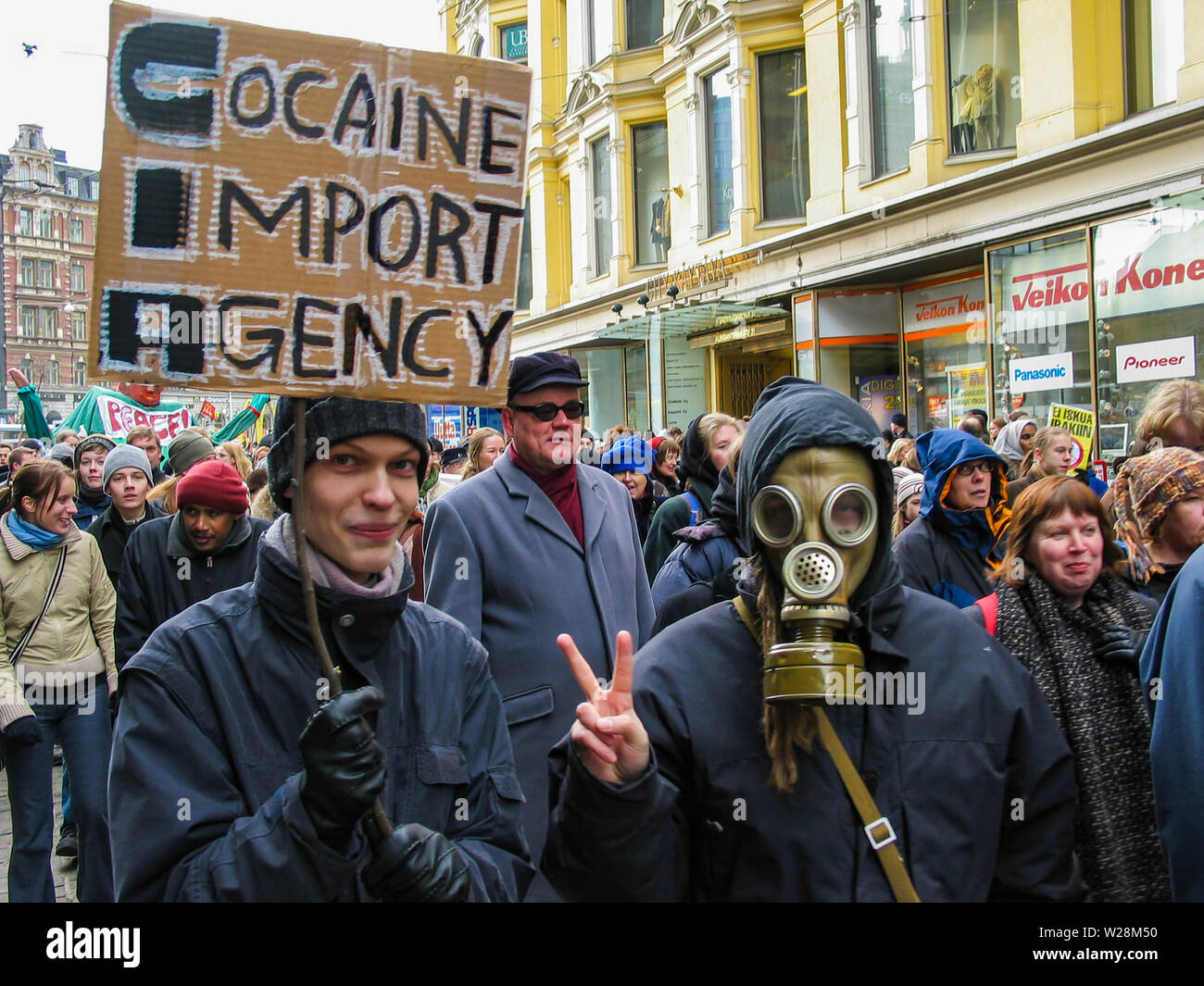 Helsinki, Finland - March 22, 2003: Anti-war protesters march through downtown Helsinki to protest the impending United States invasion of Iraq. Stock Photo