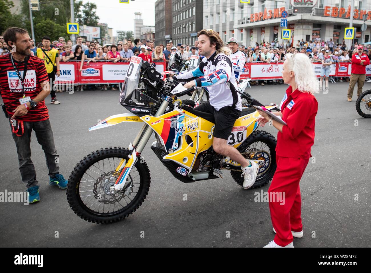 Irkutsk, Russia. 6th July, 2019. Ht Rally Raid Husqvarna Racing's Max Hunt (C) participates in the opening ceremony of the Silk Way Rally 2019 in Irkutsk, Russia, July 6, 2019. Credit: Bai Xueqi/Xinhua/Alamy Live News Stock Photo