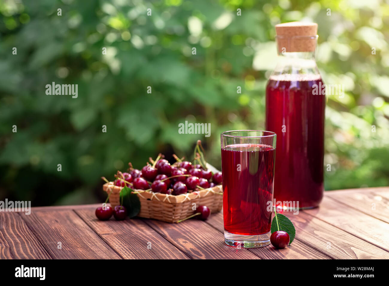 Download Cherry Juice In Glass And Bottle Stock Photo Alamy PSD Mockup Templates