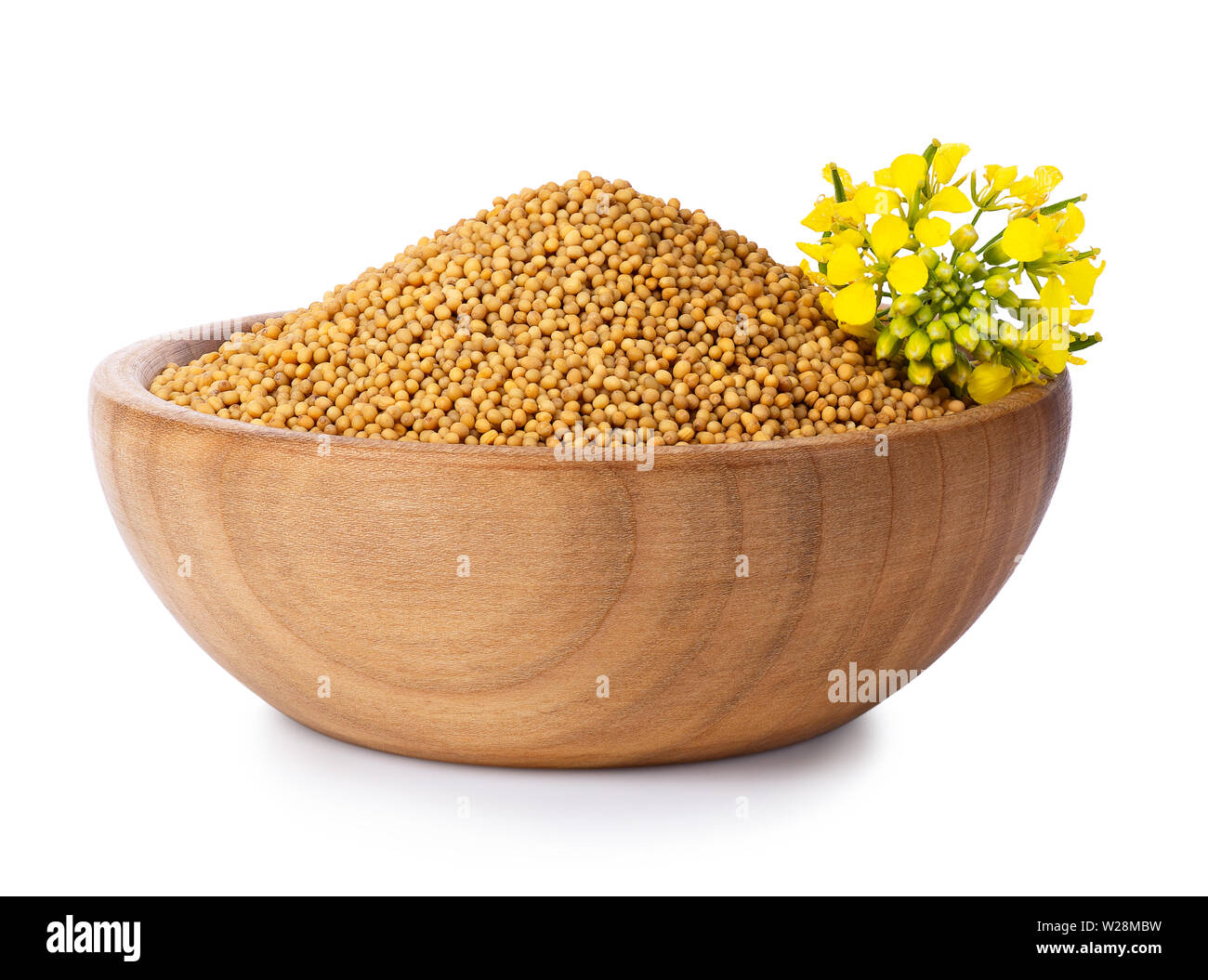 mustard seeds in wooden bowl Stock Photo