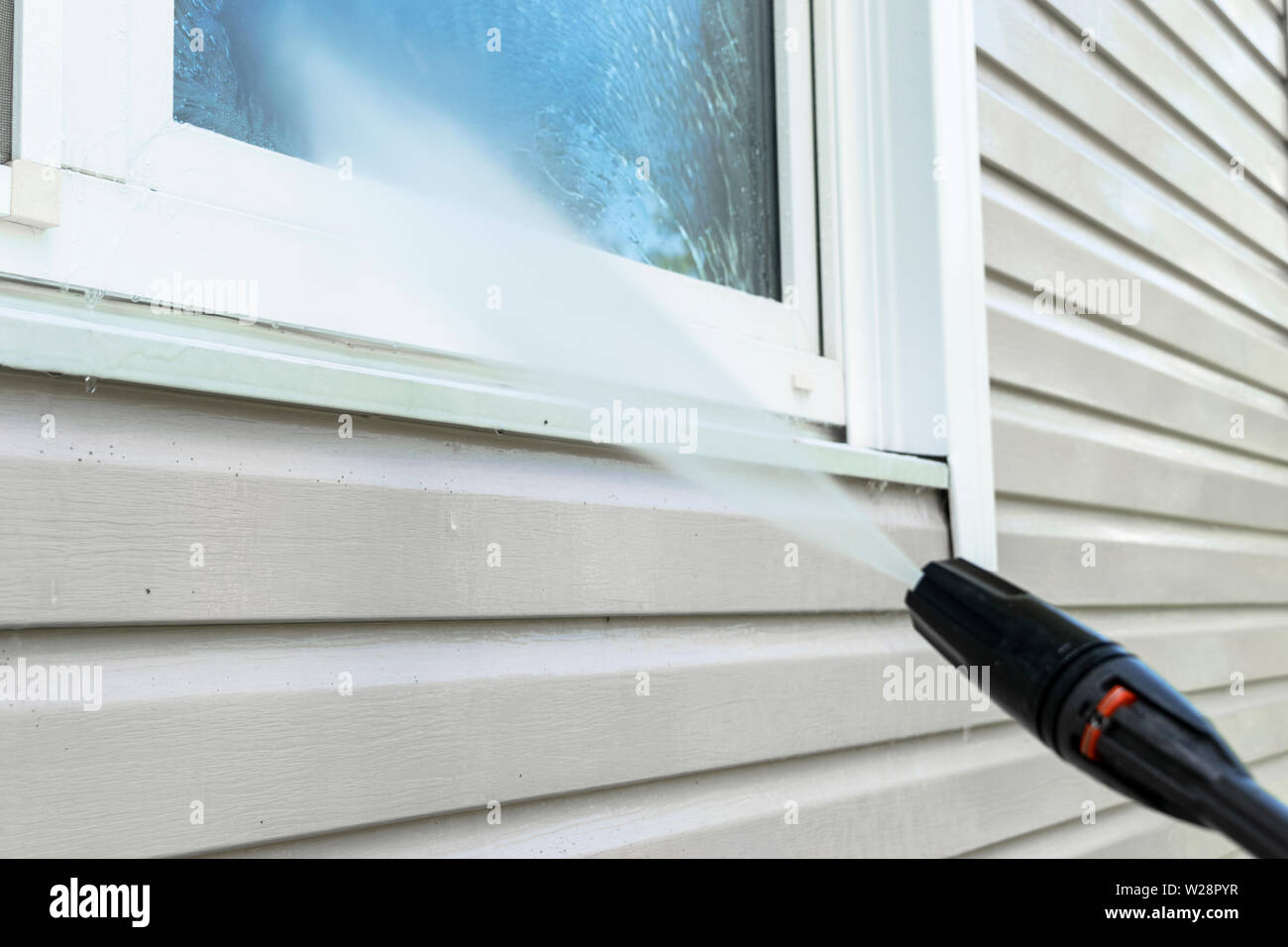 Steam Cleaning Windows with Pressure Editorial Photography - Image