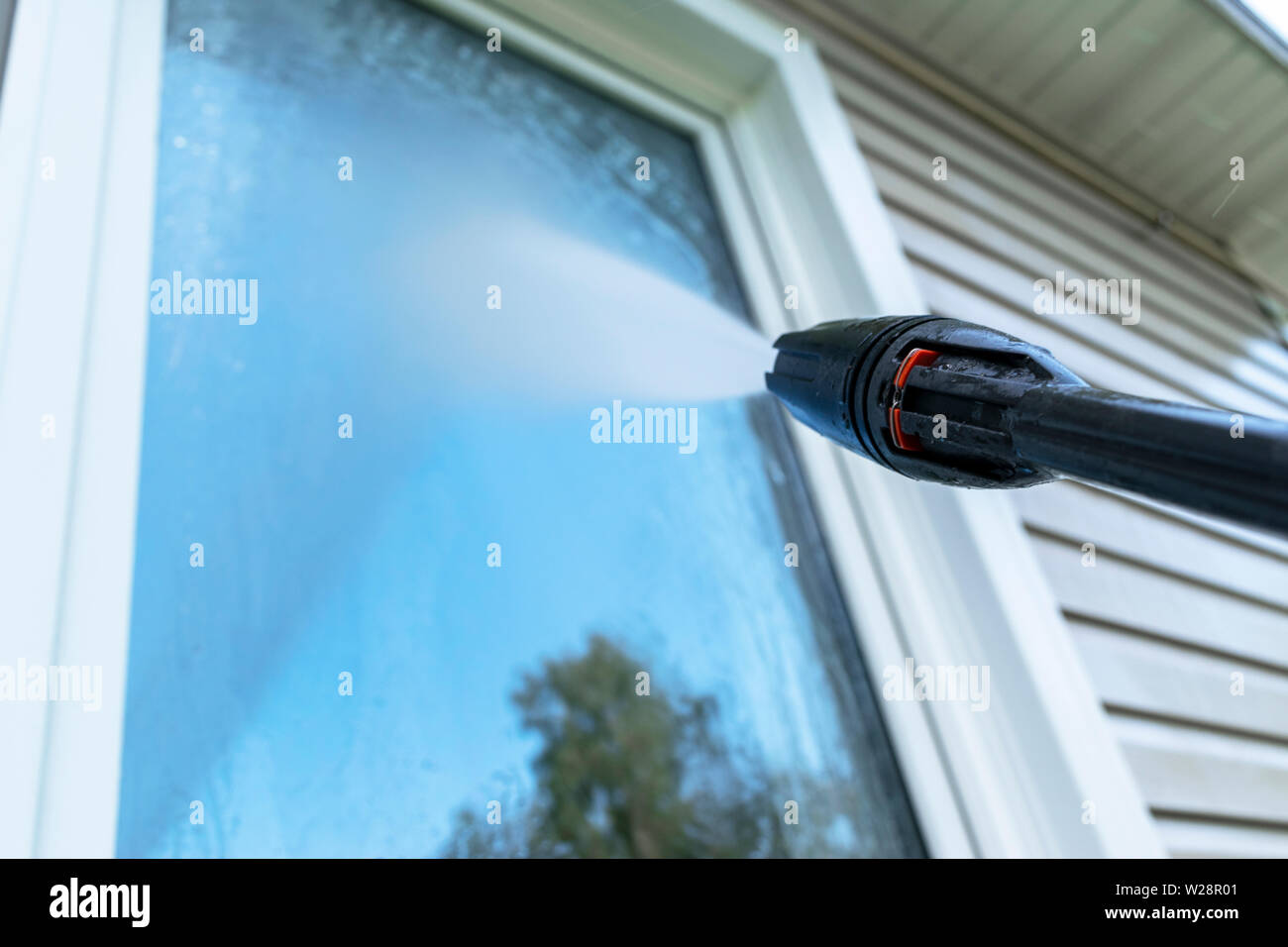 Steam Cleaning Windows with Pressure Editorial Photography - Image