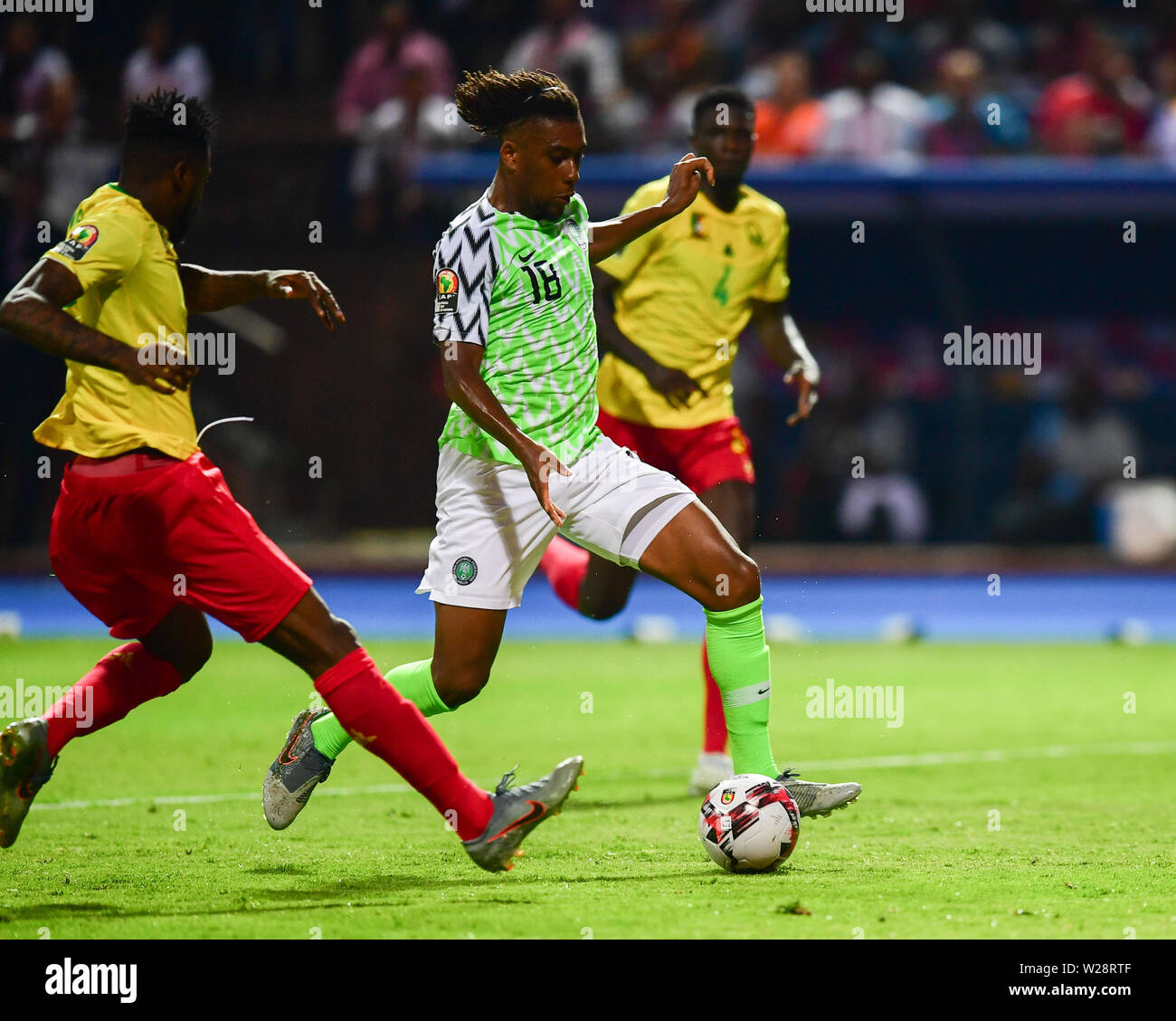 Alexandria, Egypt. 6th July, 2019. Alex Iwobi (C) of Nigeria comeptes during the round of 16 match between Nigeria and Cameroon at the 2019 African Cup of Nations in Alexandria, Egypt, July 6, 2019. Credit: Wu Huiwo/Xinhua/Alamy Live News Stock Photo