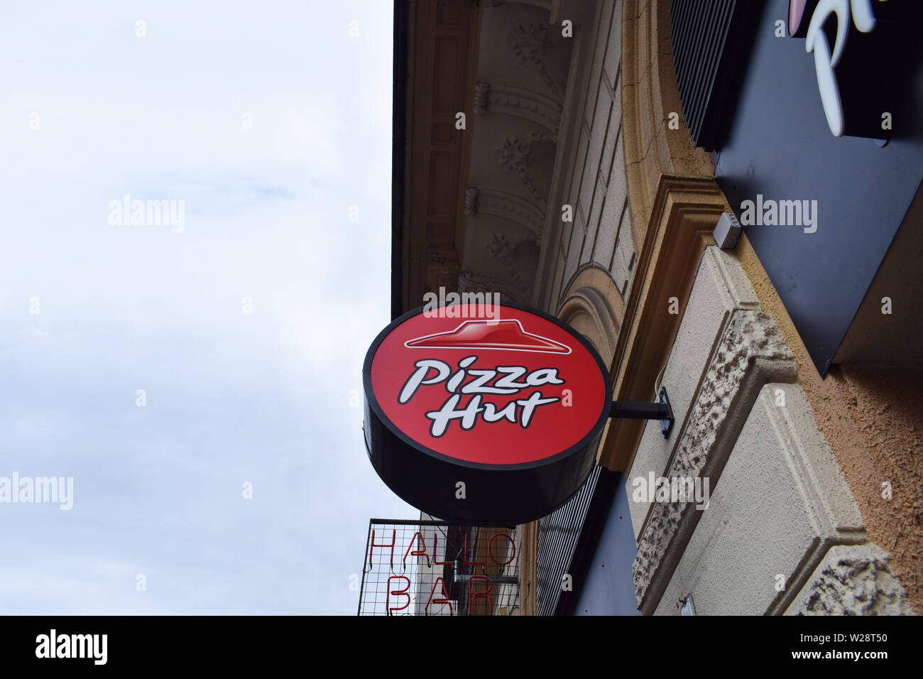 Budapest, Hungary: May/22/2019 - Pizza Hut logo street sing. Stock Photo