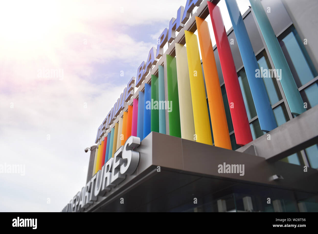 Varna, Bulgaria: May/20/2019 - Varna airport with new colorful design against blue cloudy sky and warm sunlight during the day. Stock Photo