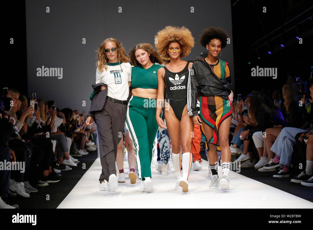 Berlin, Germany. 06th July, 2019. Models show fashion at the Adidas Show  during the About You Fashion Week at the E-Werk in Berlin. The collections  for Spring/Summer 2020 will be presented at