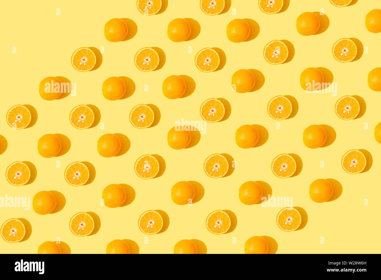 Orange seamless pattern on yellow background Stock Photo