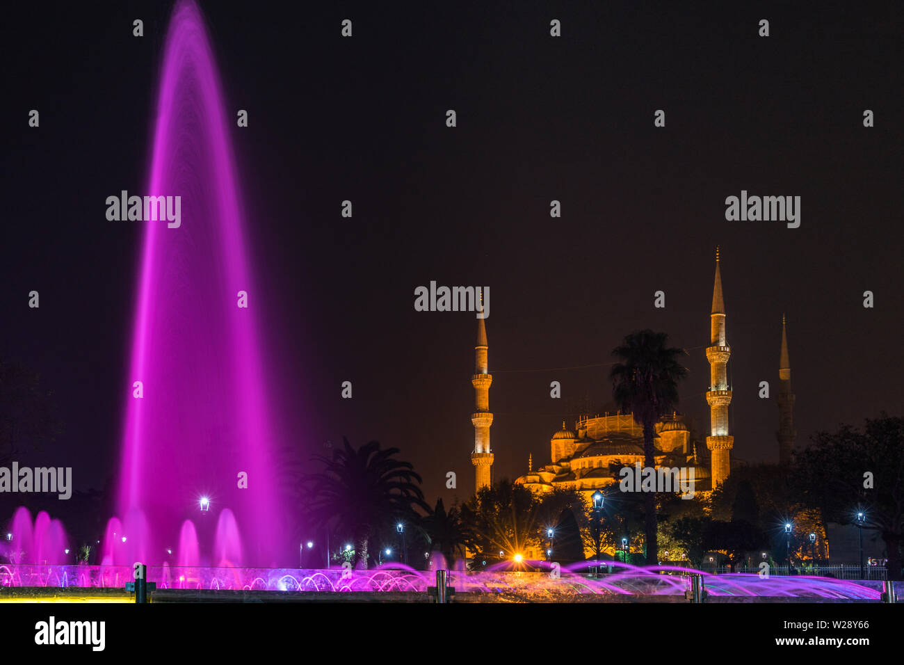 Night cityscape of Sultanahmet square with illuminated fountain and ...