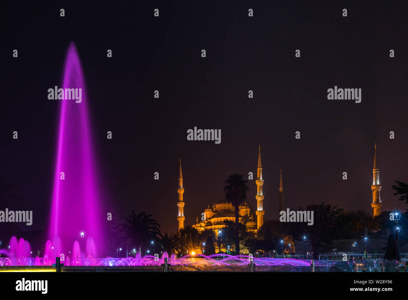 Night cityscape of Sultanahmet square with illuminated fountain and ...