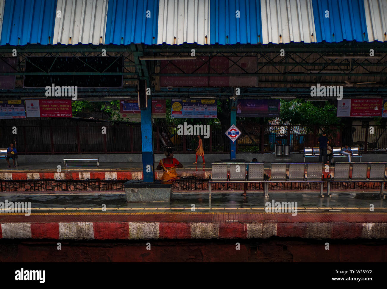 Mumbai, India - June 30, 2019 :  Mumbai Suburban Railway Station - Mulund, Central Raiilway one of the busiest commuter rail systems in the world havi Stock Photo