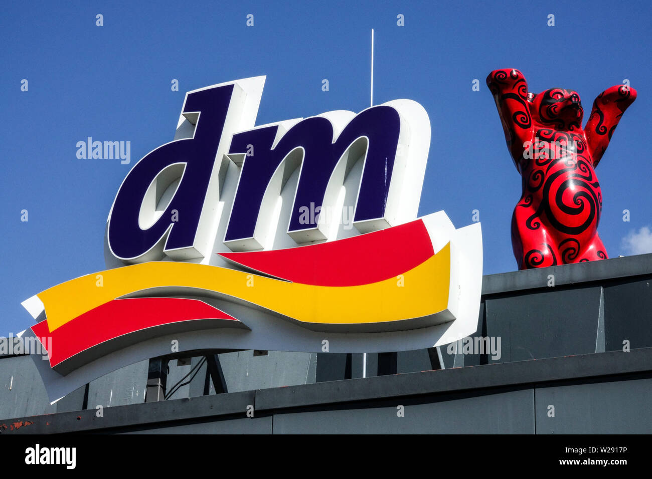 DM logo and red bear, Berlin Germany Stock Photo