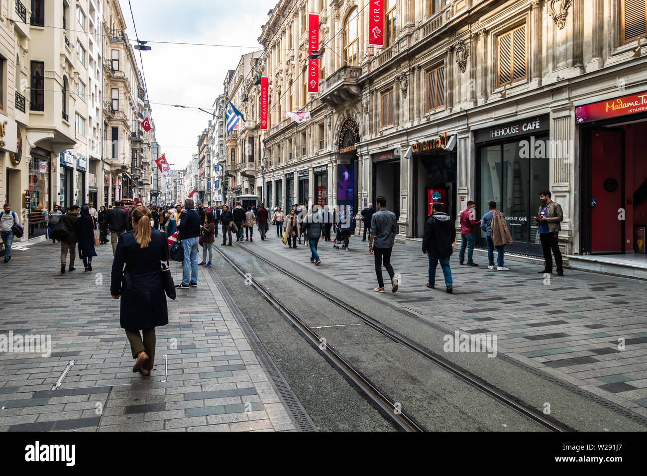 Istiklal Avenue is an elegant pedestrian street in Istanbul Beyoglu district which houses shops, restaurant, café, boutique and art galleries Stock Photo