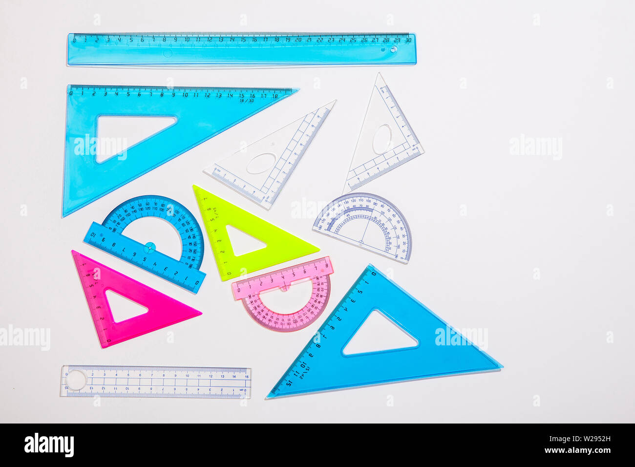 Multi Colored Ruler Copy space. Multicolored rulers for schoolchild on white background ...