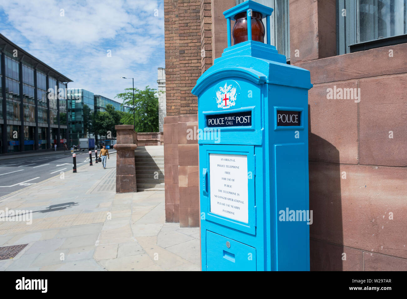 A disused City of London Public blue police call telephone box near in the City of London England, UK Stock Photo