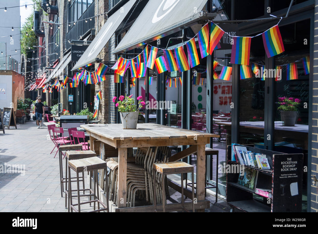 Pride's LBGT Rainbow flag and bunting at the Old Union Yard Arches foodie-hub near Bankside, Southwark, London, SE1, UK Stock Photo