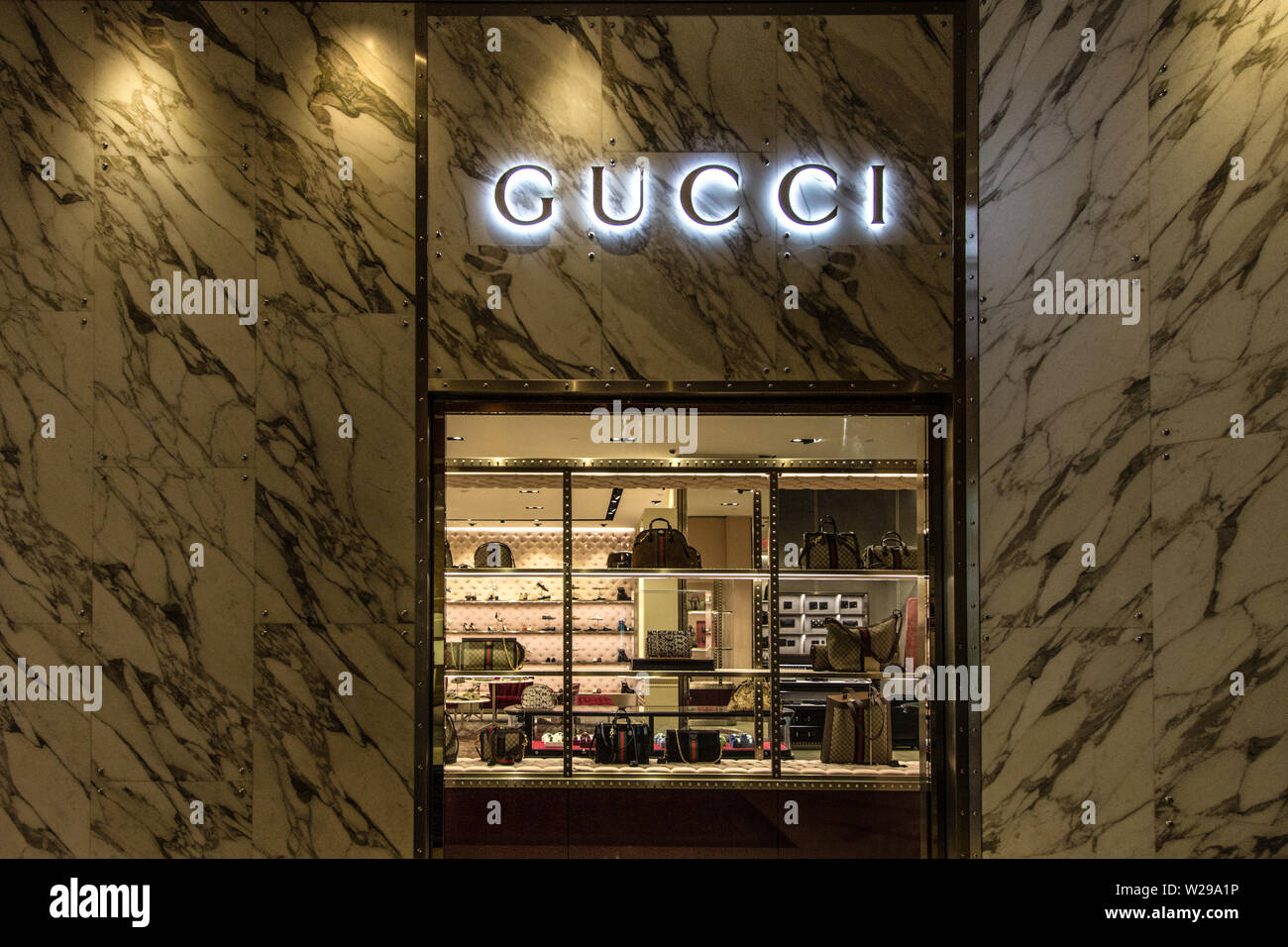 Louis vuitton boutique. Signboard logo brend sign of Gucci on store, shop,  mall, boutique. Kiev, Ukraine - September 02, 2019 foto de Stock