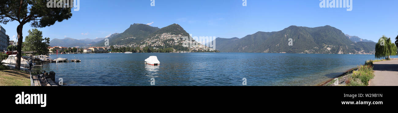 Panoramic view of the lake of Lugano with the mountain Bre in the background, Switzerland Stock Photo