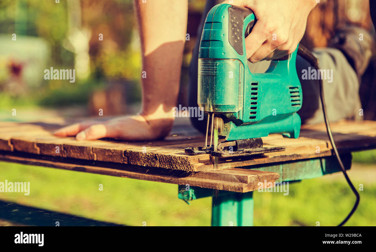 Worker saws hires stock photography and images Alamy