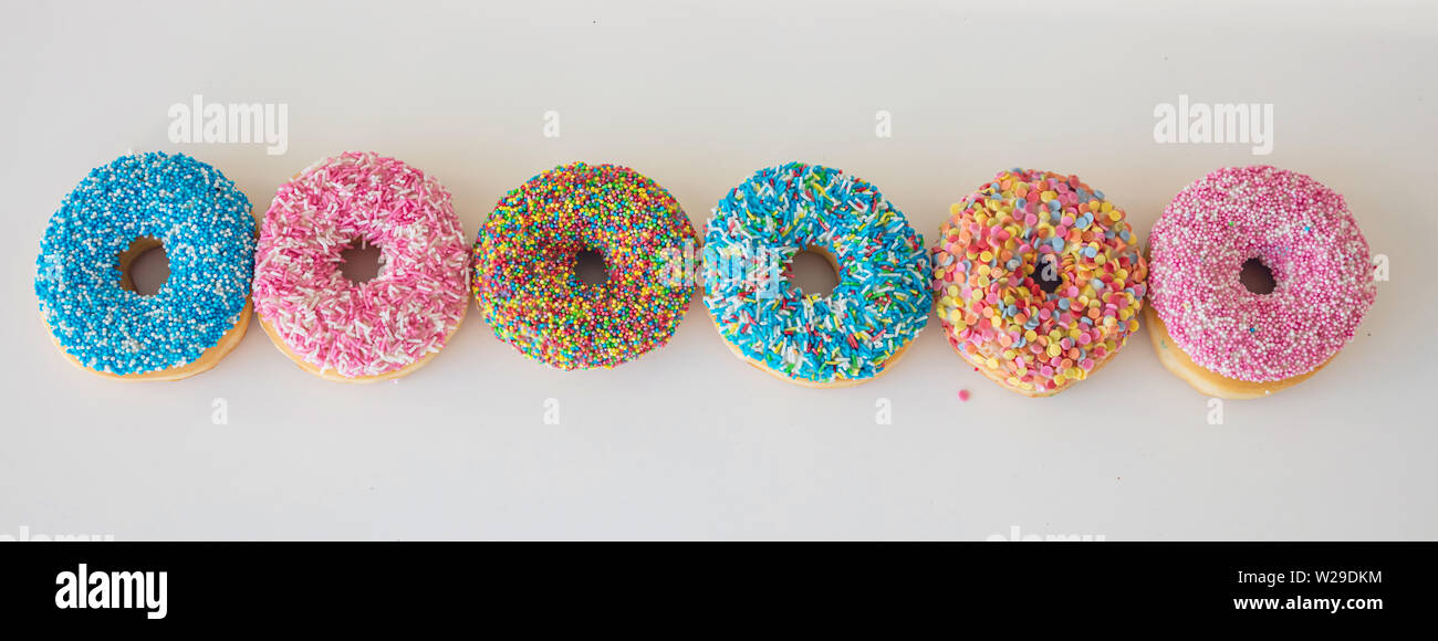 Assorted donuts. Colorful donuts assortment on white color background ...