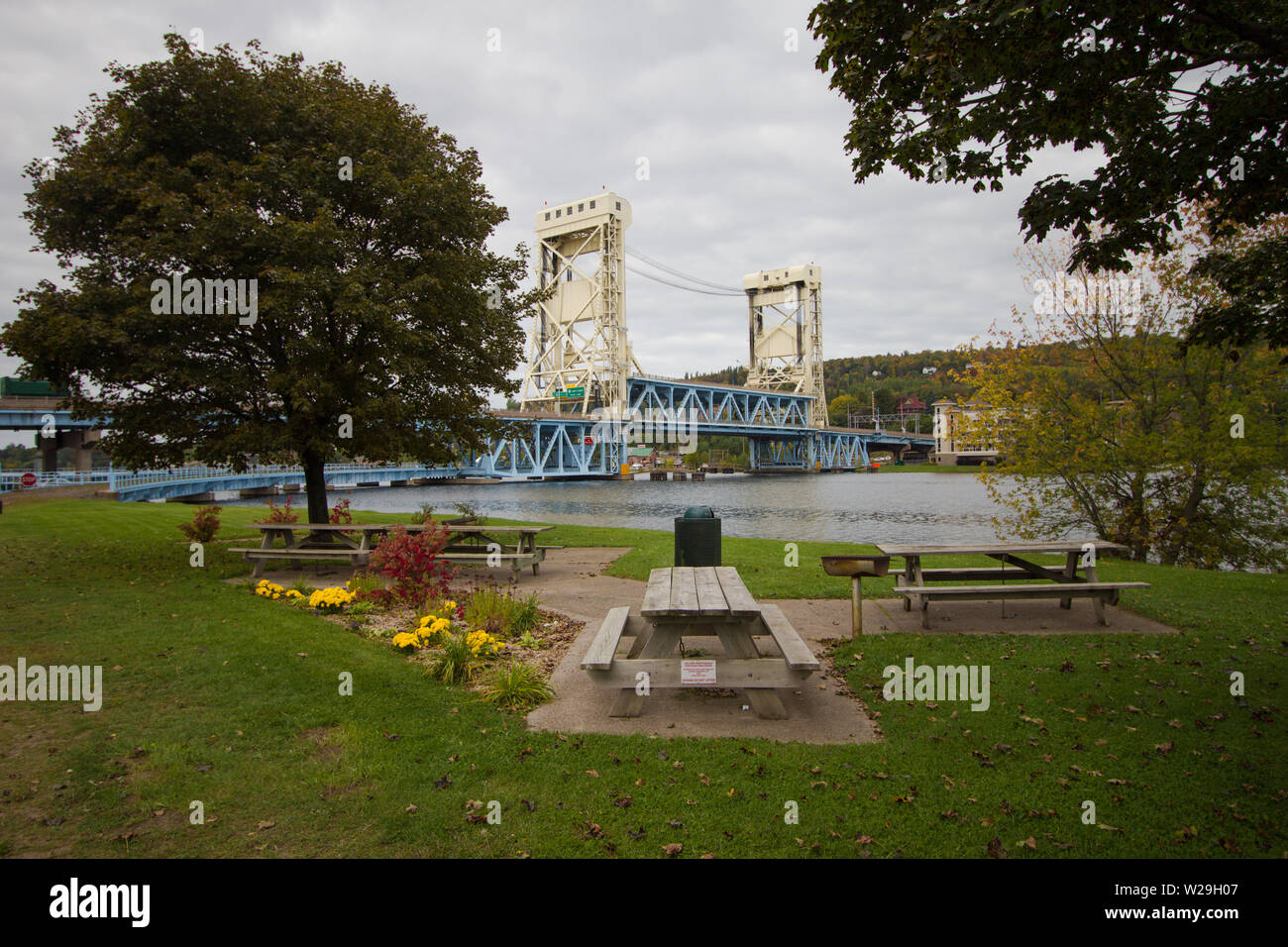 Bridgeview Park in downtown Houghton Michigan with the historical Portage Lift Bridge in the background. Stock Photo