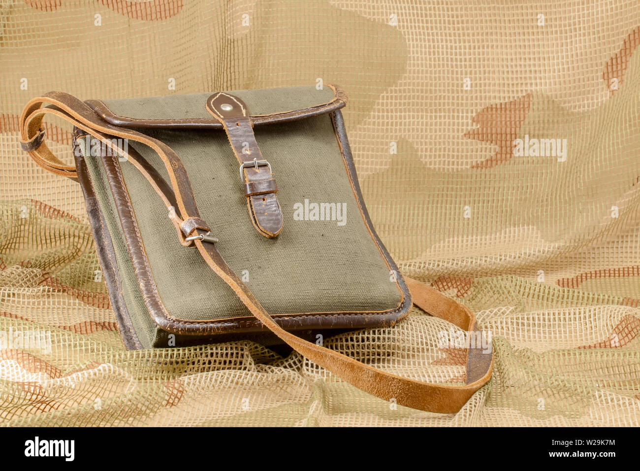 Vintage leather and canvas suitcase Stock Photo - Alamy