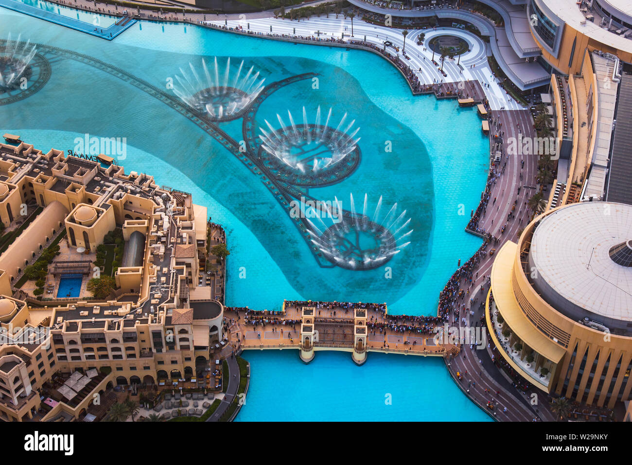 Dubai, United Arab Emirates - July 5, 2019: Dubai mall fountain show surrounded and modern downtown buildings view from above Stock Photo