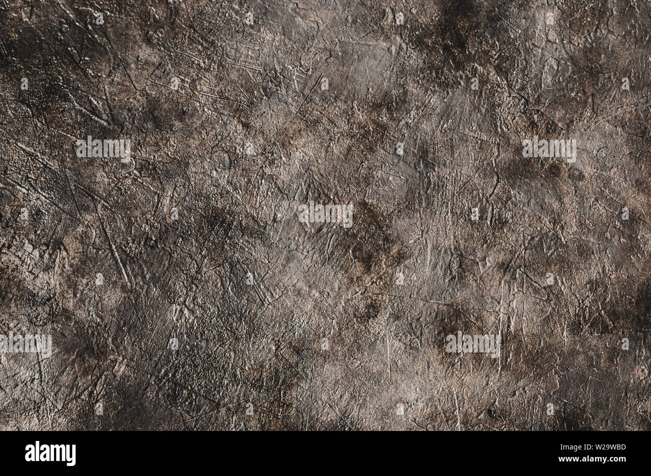 Dirty, abstract, relief stone wall background close up. Stock Photo