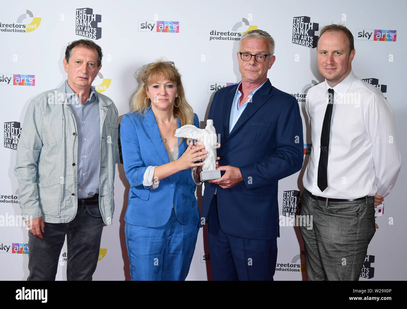 David Lan, Sonia Friedman, Stephen Daldrey and Justin Martin with the Theatre Award , for The Inheritance, at the South Bank Sky Arts Awards at the Savoy Hotel in London. Stock Photo