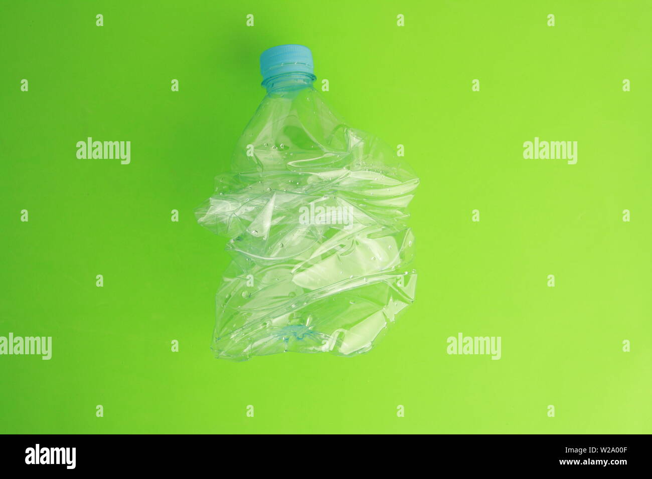 Empty plastic water bottle scaled for recycling Stock Photo