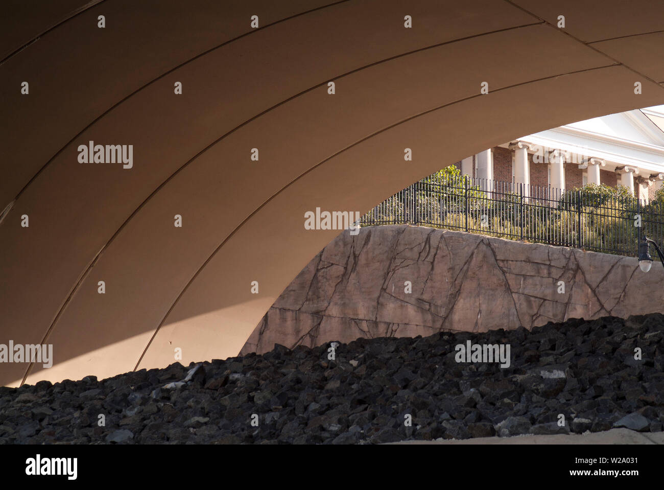 OPERA HOUSE: An amphitheater like arch is formed under an overpass from a bridge above. Stock Photo